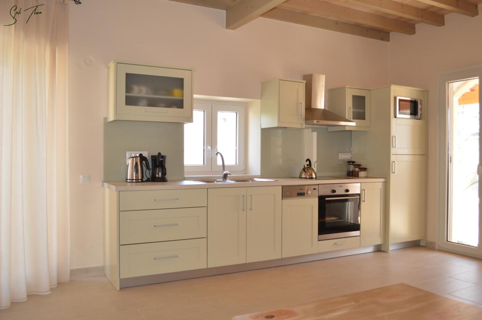 Spiti Thea Apartment Makrádes Екстериор снимка